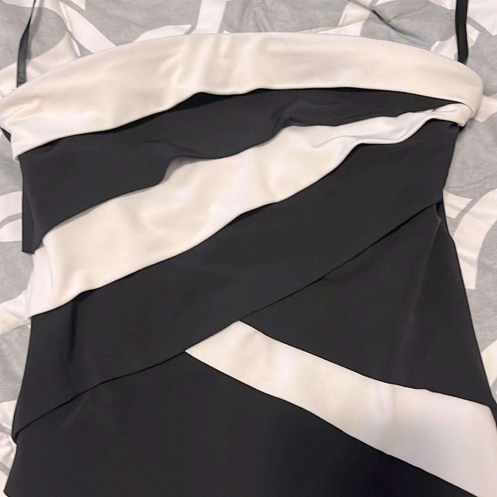 Black & white slimming strapless (optional straps included) dress.